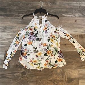 Woman’s open shoulder top